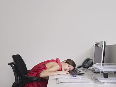 Woman napping at desk