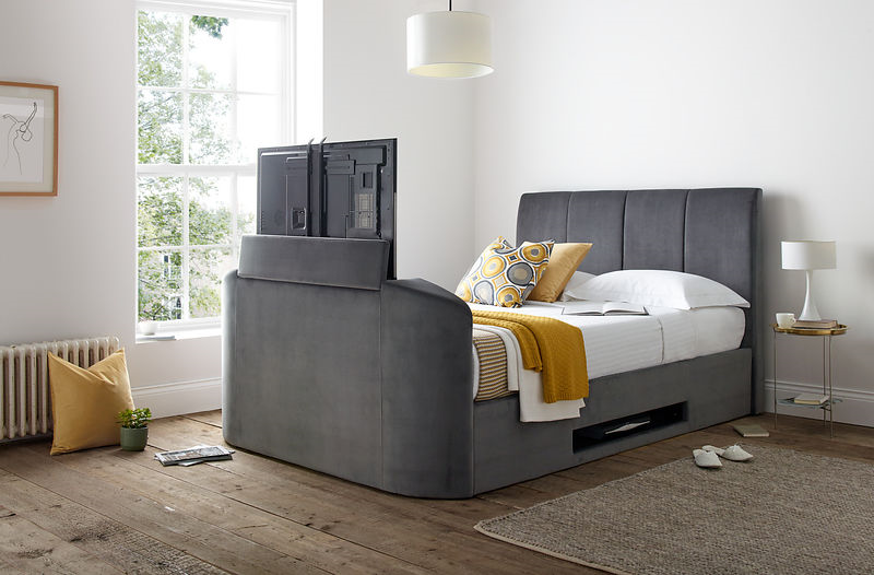 copenhagen tv bed in grey with yellow pillows